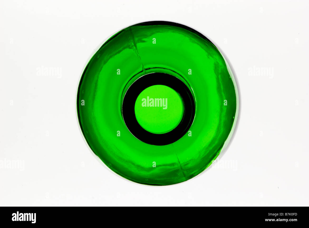 Abstract looking down on top of empty green glass bottle Stock Photo