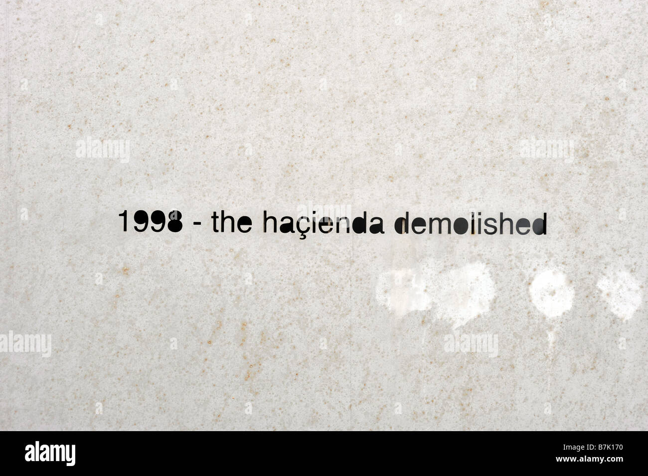 1998 the hacienda demolished metal hacienda memorial plaque factory records nightclub manchester uk england Stock Photo