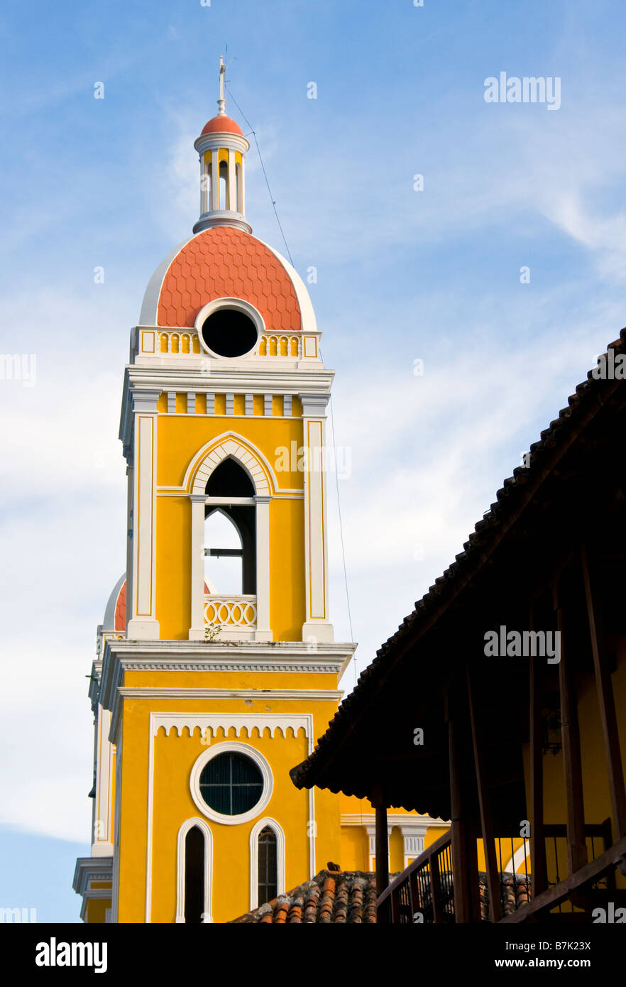 Colonial Granada architecture, the Cathedral bell tower and Hotel La Gran Francia facade Stock Photo
