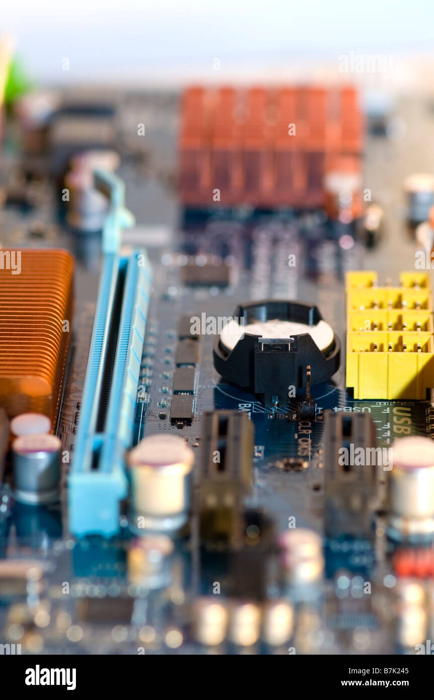 CMOS Battery on the computer motherboard Stock Photo