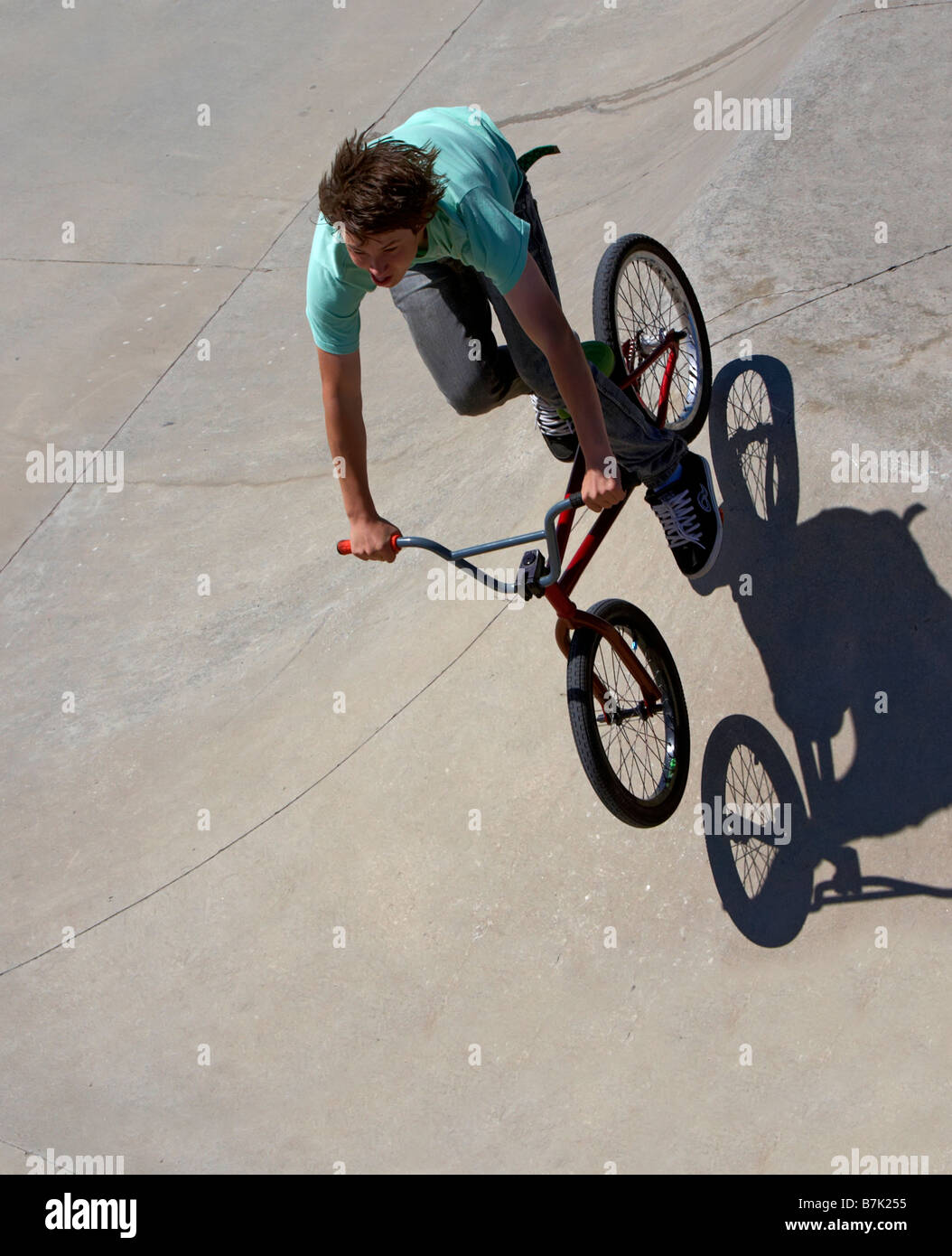 Bike rider makes a jump at a skate park Stock Photo Alamy