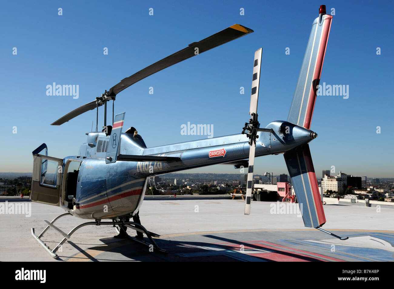 helicopter on top of a downtown los angeles LA take off landing site california Stock Photo