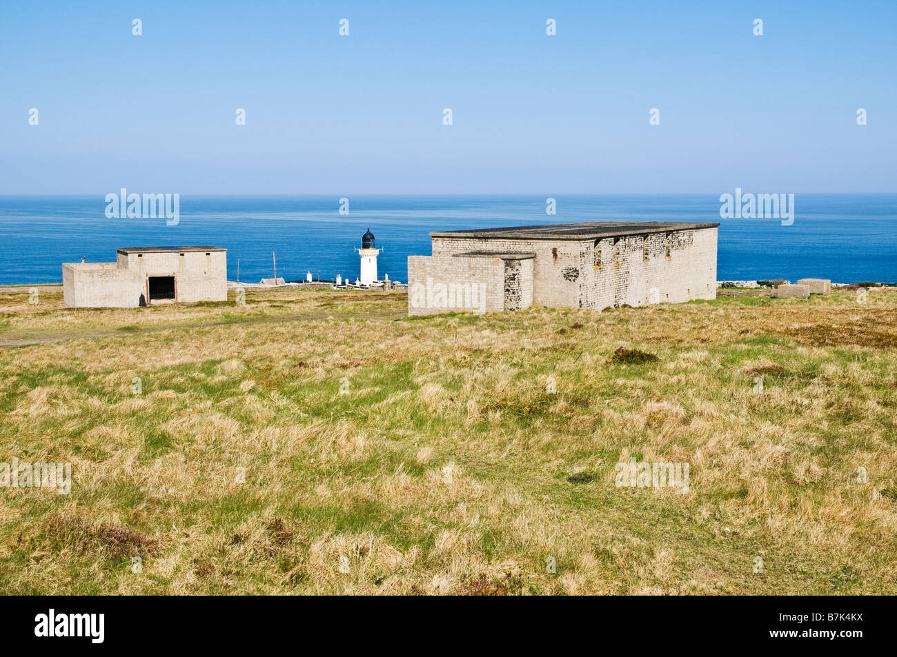 Abandoned military buildings overlook Pentland Firth at Head