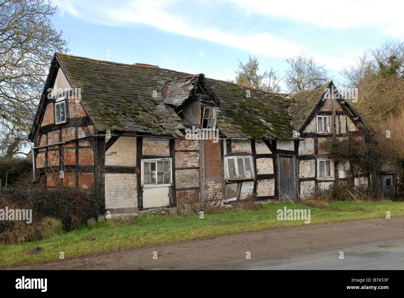 Derelict cottage which is still occupied at Willersley Herefordshire England Uk Stock Photo