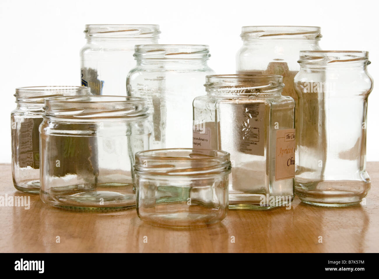 Assorted empty glass jars Stock Photo