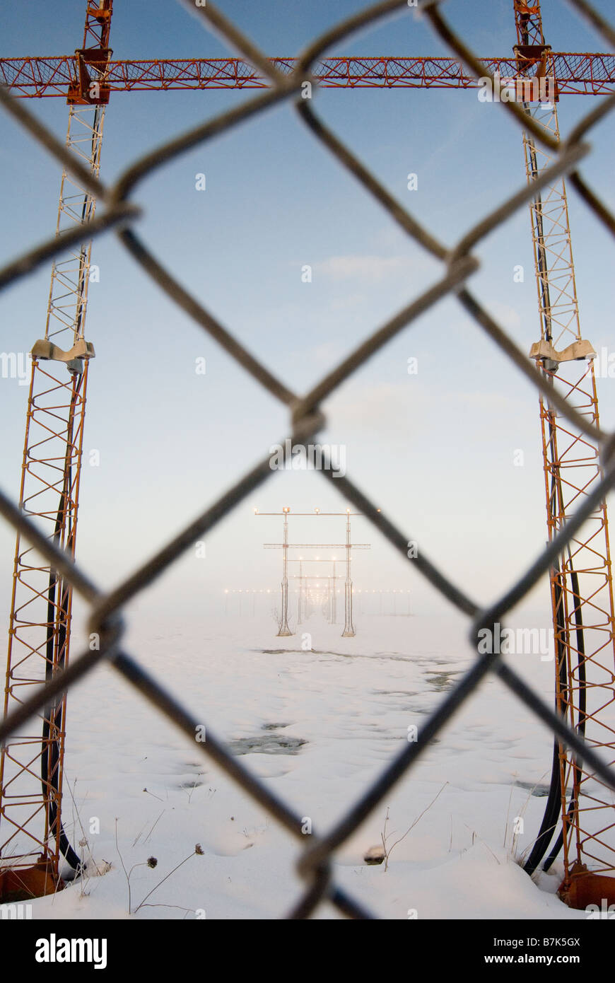 Airport approach towers and chain link fence, Victoria International