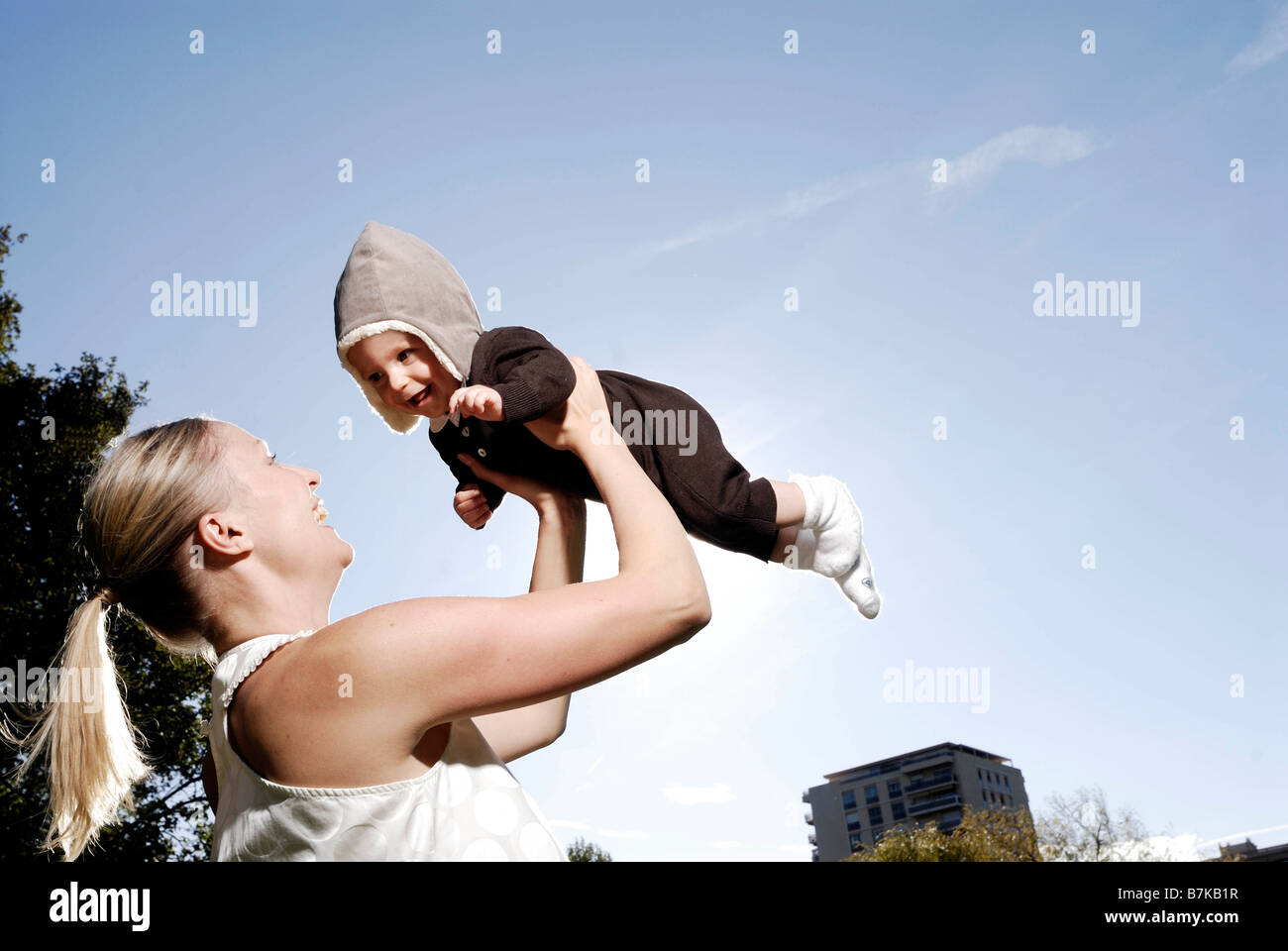 Mother holding baby Stock Photo Alamy