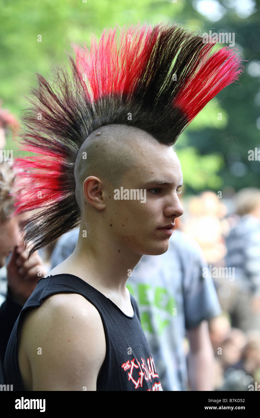 Punk boy with black red Mohawk Stock Photo