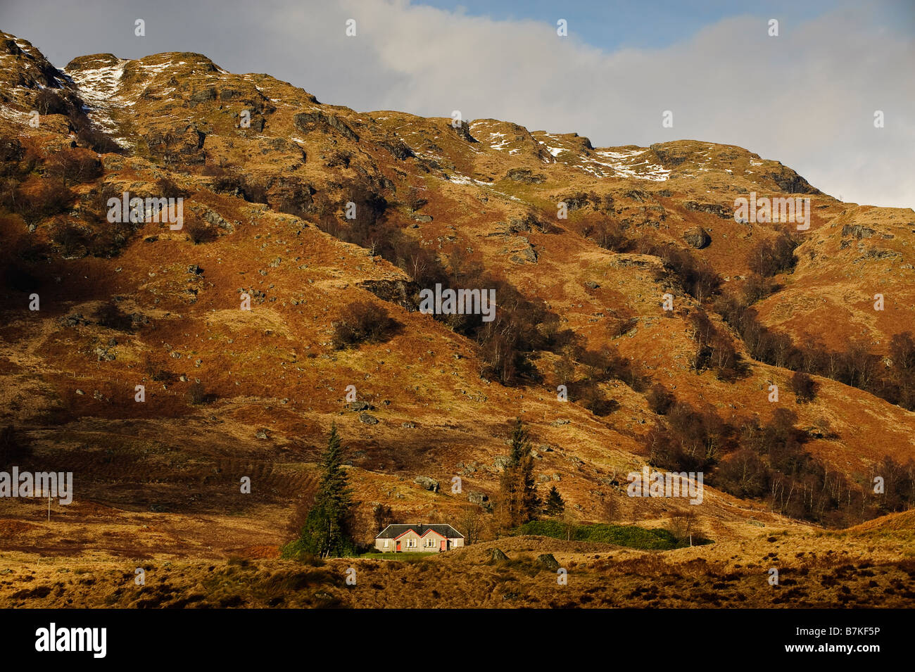 A house in the hills near Lock Arklet in the Trossachs. Stock Photo