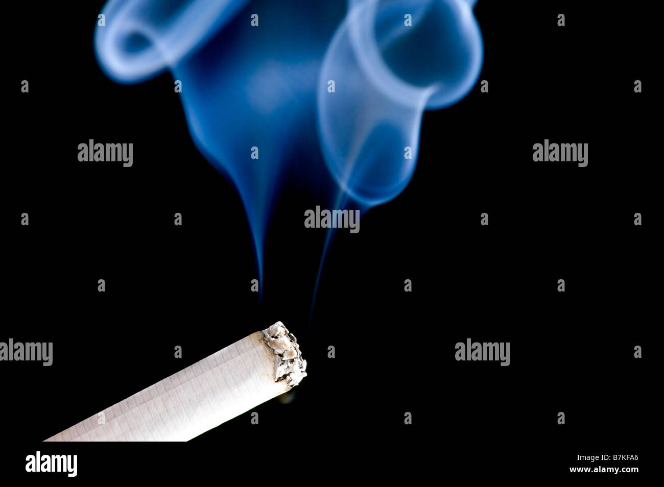 object on black cigarette with smoke Stock Photo Alamy