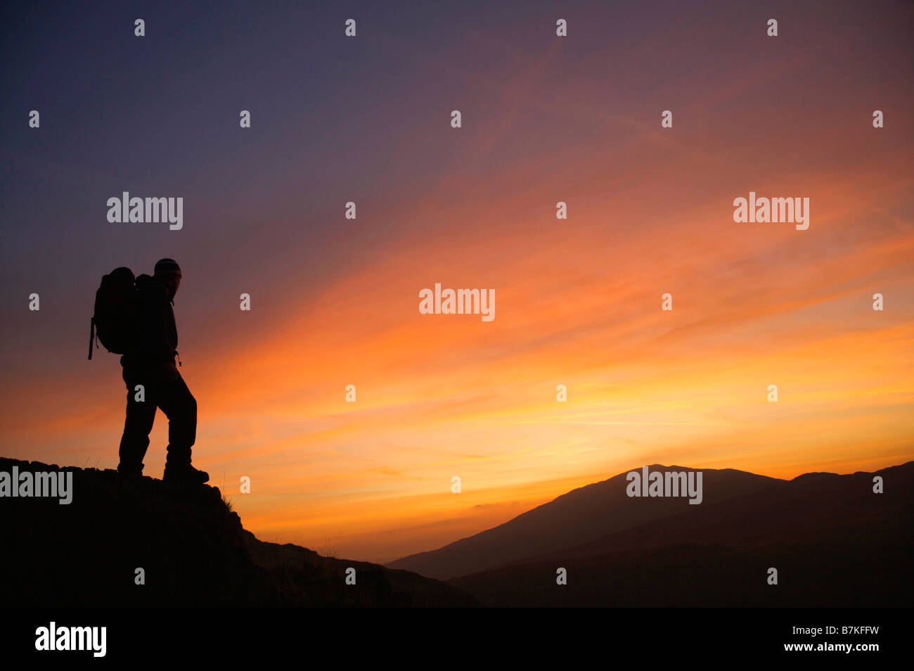 Hiker at sunrise hi-res stock photography and images - Alamy