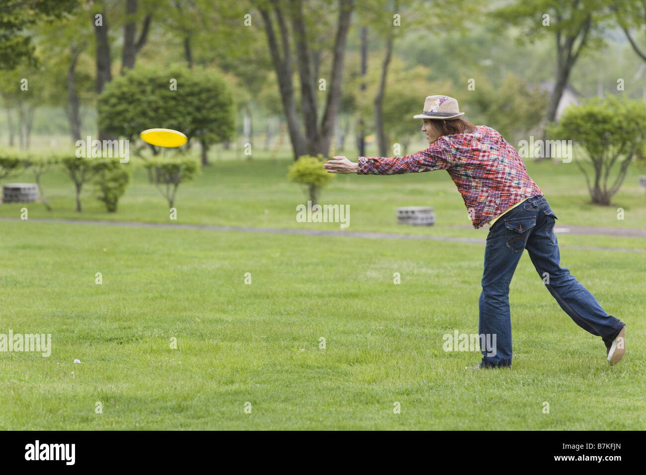 Man Throwing a Frisbee Stock Photo Alamy