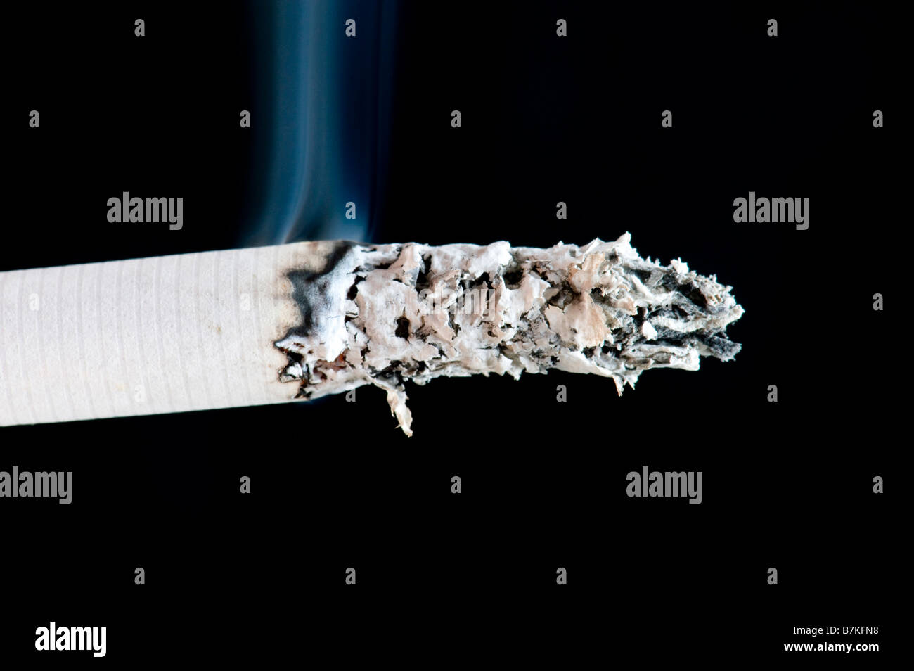 object on black cigarette with smoke Stock Photo Alamy