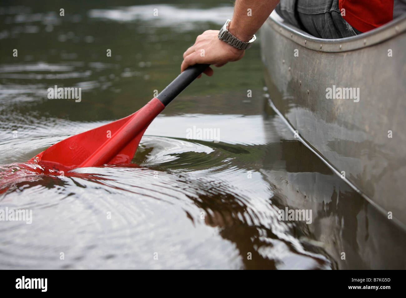 Kayak paddle stroke in water Stock Photo Alamy