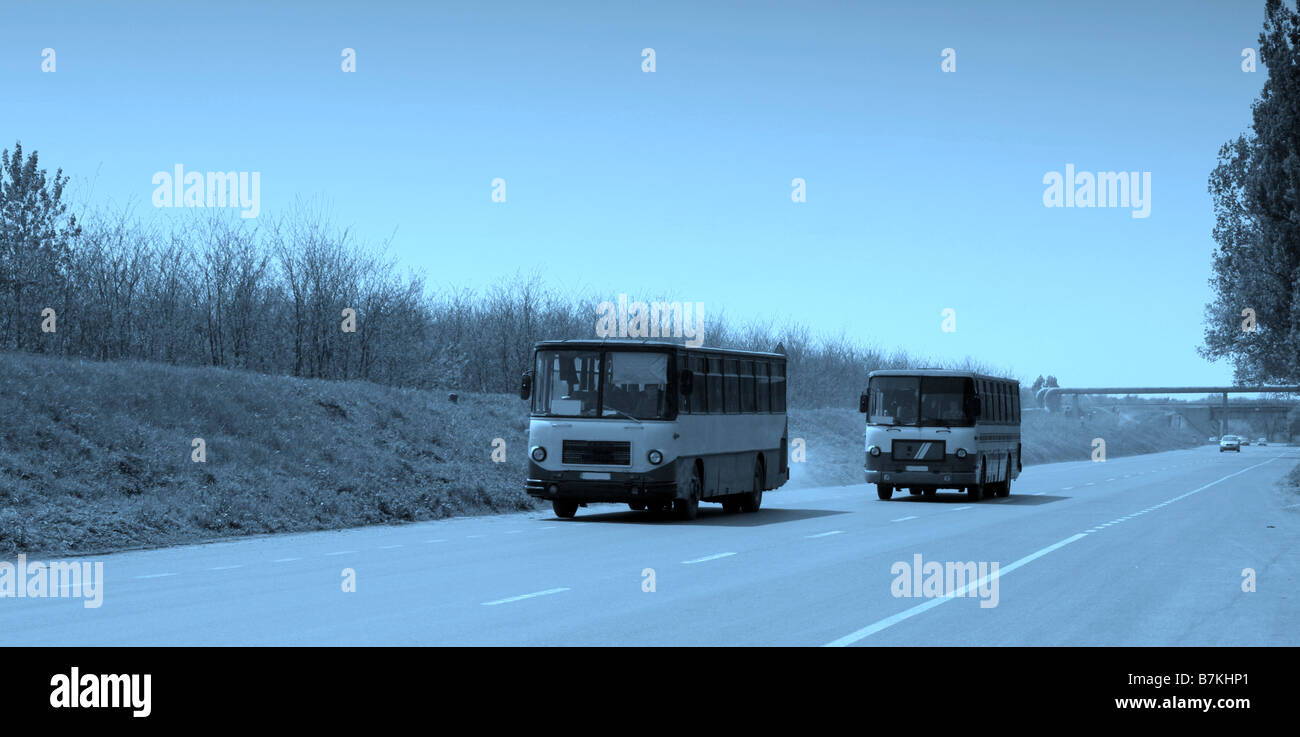 Cars buses moving in front hi-res stock photography and images - Alamy
