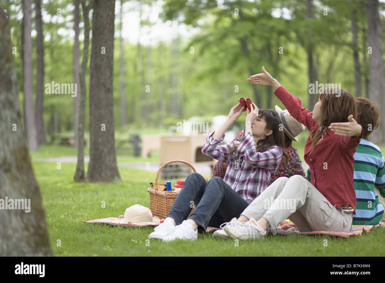 Men and Women Having a Picnic Stock Photo - Alamy