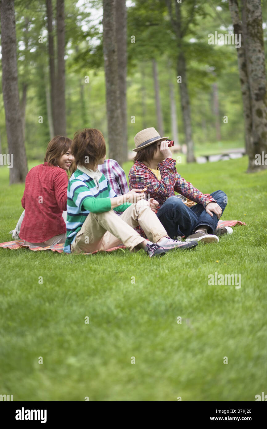 Men and Women Having a Picnic Stock Photo - Alamy