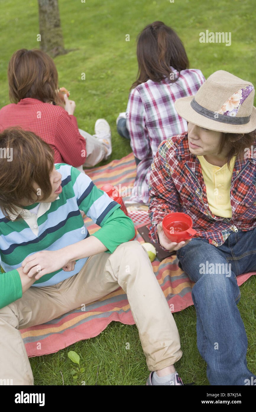 Men and Women Having a Picnic Stock Photo - Alamy