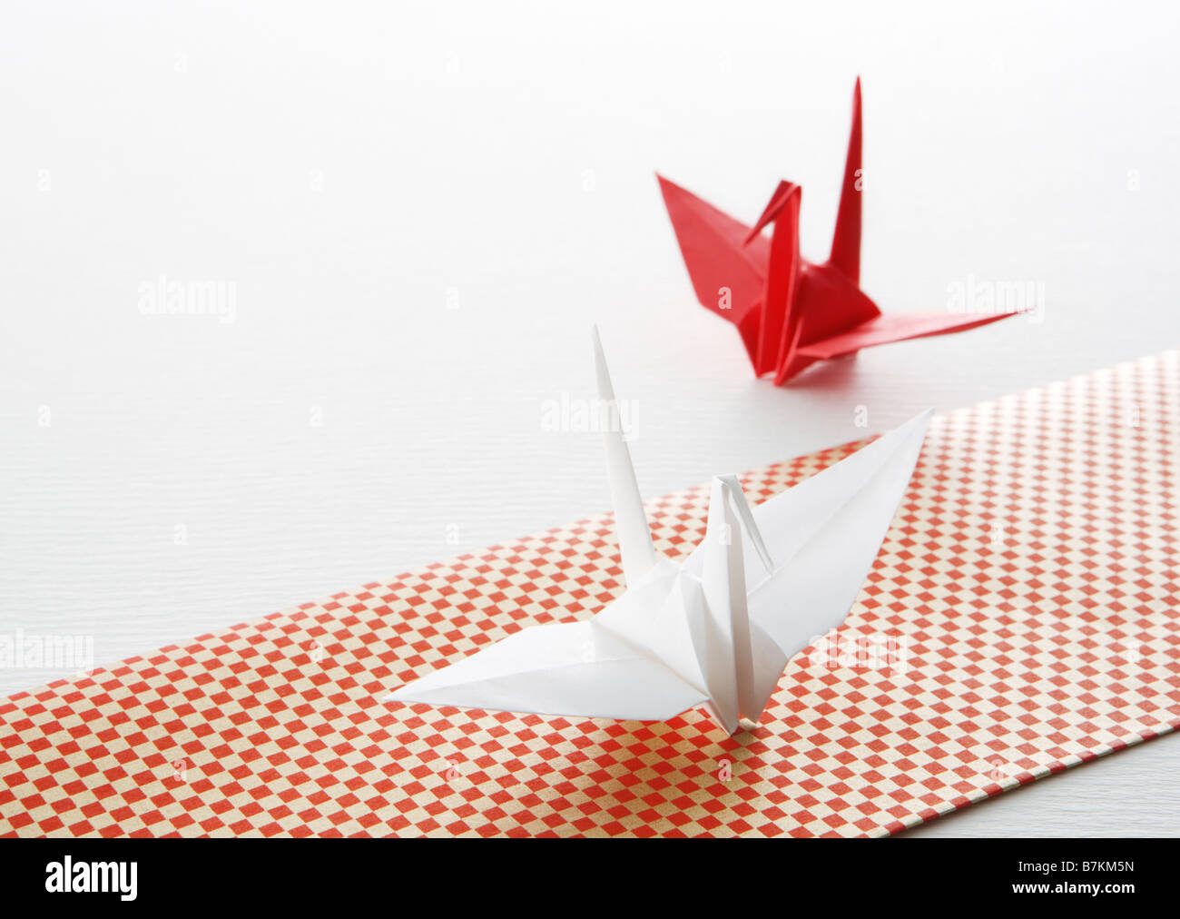 Folded paper crane Stock Photo Alamy