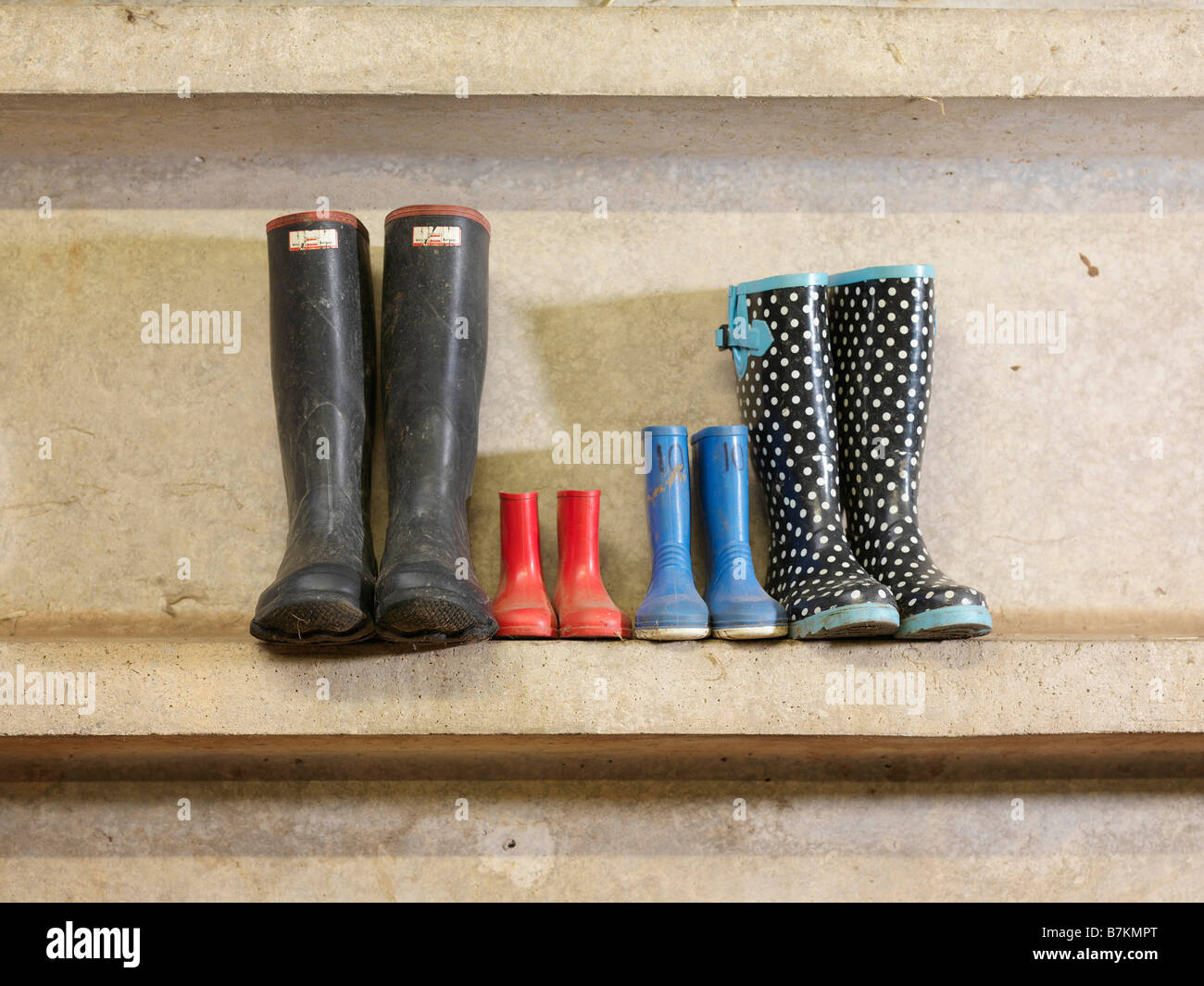 Four Pairs Of Wellington Boots Stock Photo - Alamy