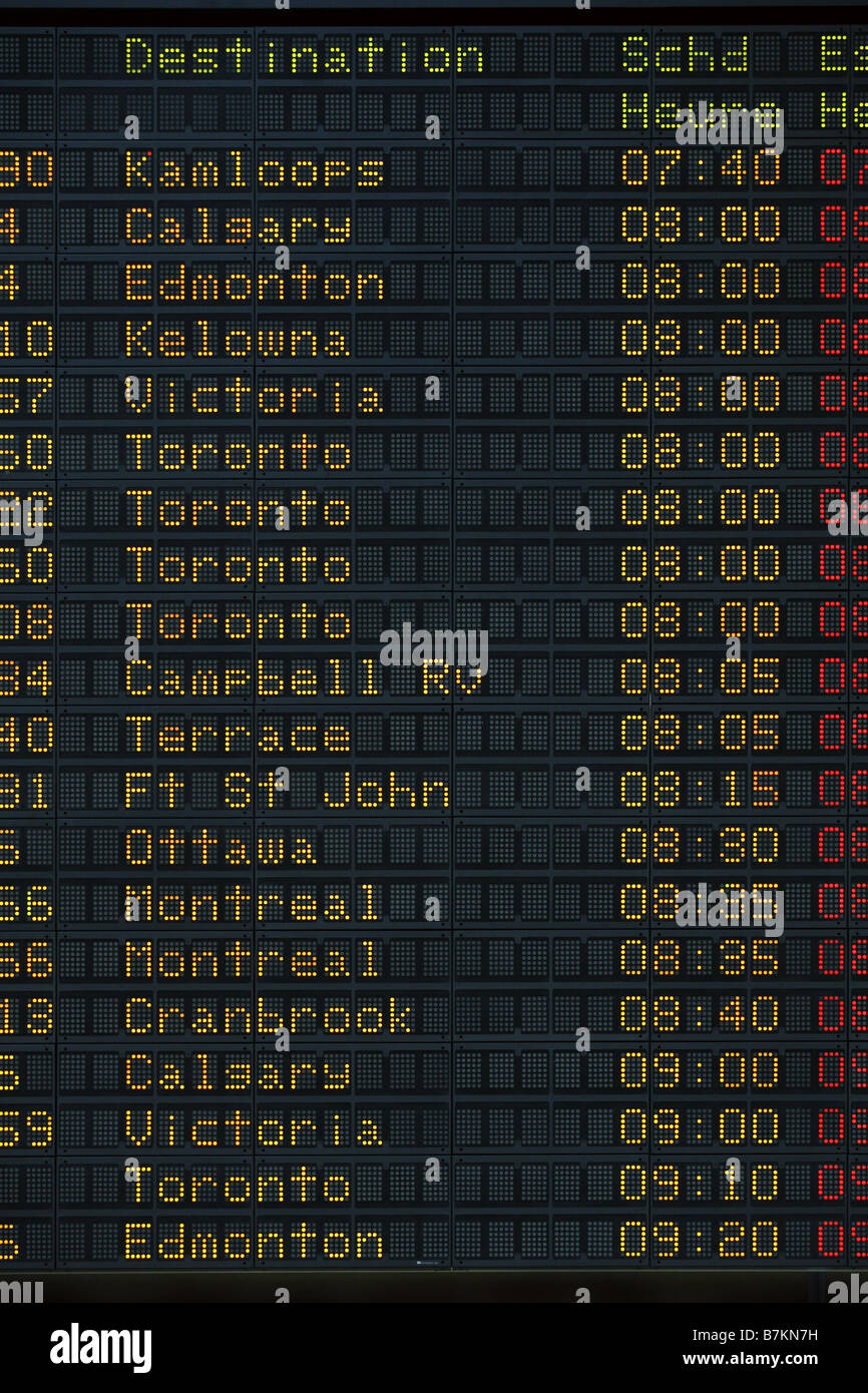 Flight Departure Board, Vancouver International Airport, British Columbia, Canada Stock Photo