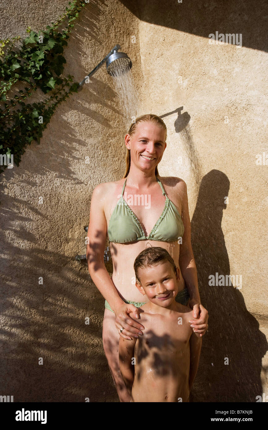 Mother and son in shower Stock Photo - Alamy