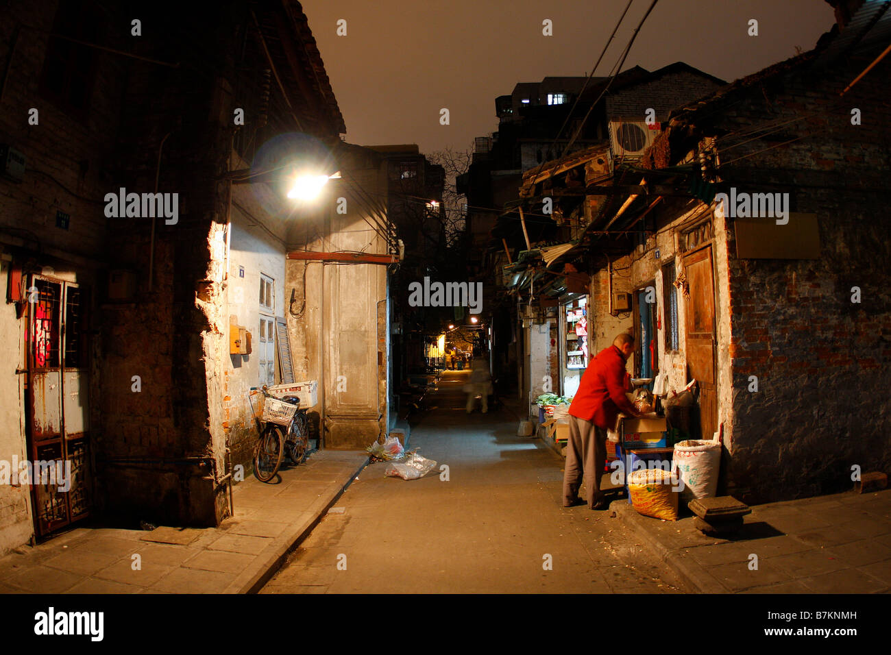 alley  China Chinese convenience culture dimly lit emergent market markets emerging Guangzhou home house income gap lane lifesty Stock Photo