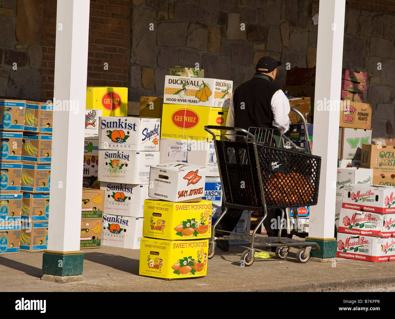 Boxes of produce at a grocery store Stock Photo Alamy