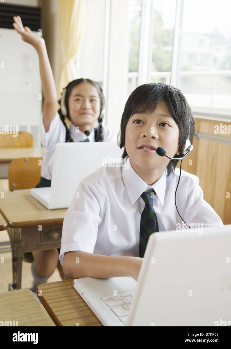 Elementary school students taking computer class Stock Photo Alamy
