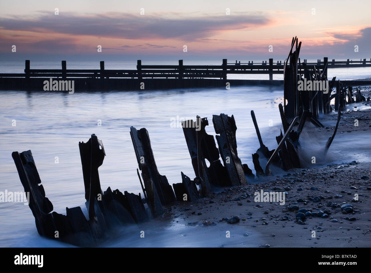 Happisburgh Beach at Sunrise in Norfolk England Stock Photo