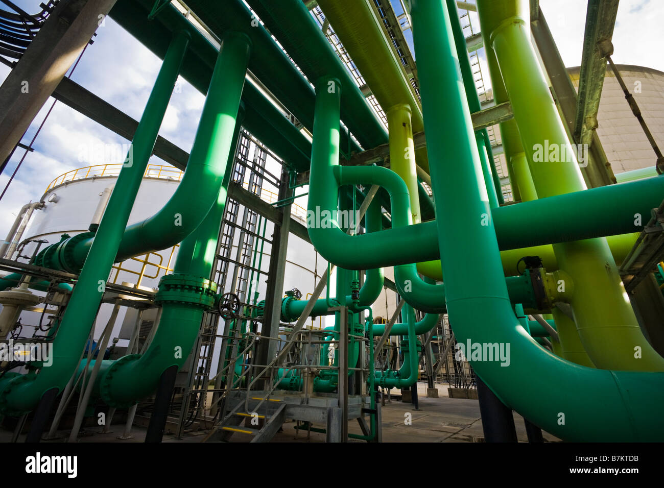 Maze of pipes inside a modern gas fired power station, UK Stock Photo