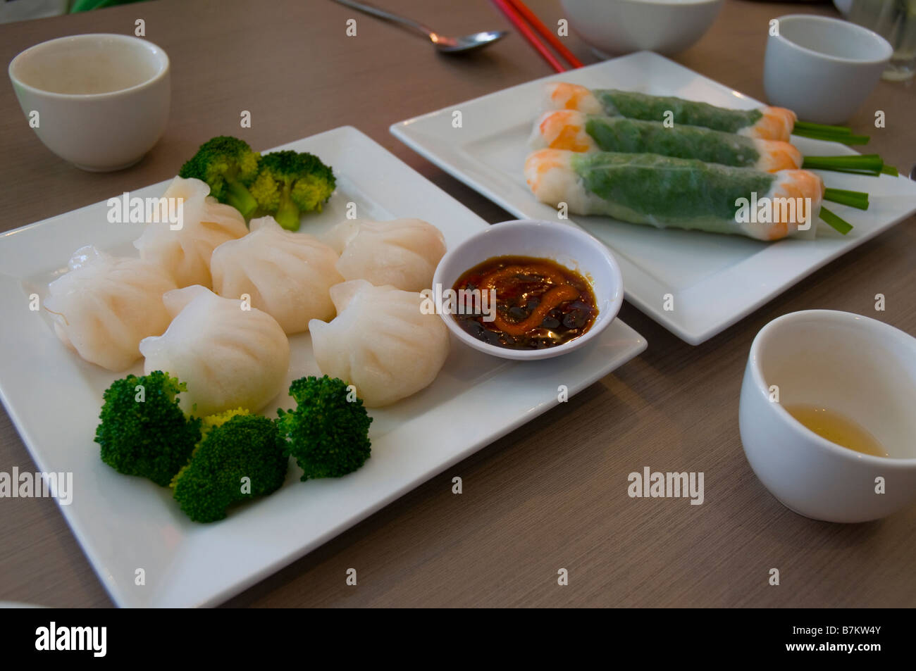 Steamed dumplings and prawn rolls in a Vietnamese restaurant in Melbourne Australia Stock Photo