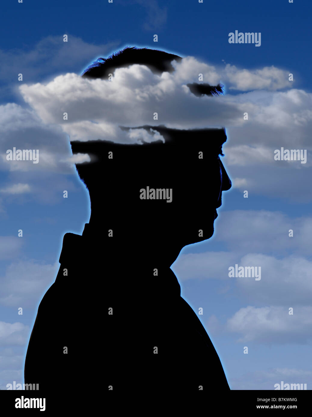 Silhouette of man with head in clouds Stock Photo - Alamy