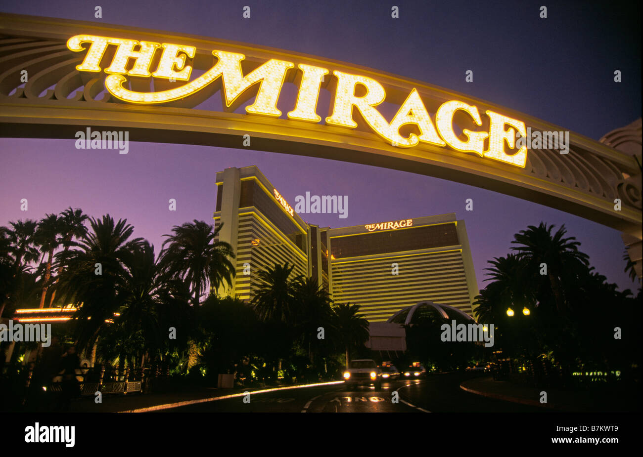 An arch over the entrance to the Mirage Hote resort and casino on the Las Vegas Strip at sunset, Las Vegas, Nevada. Stock Photo