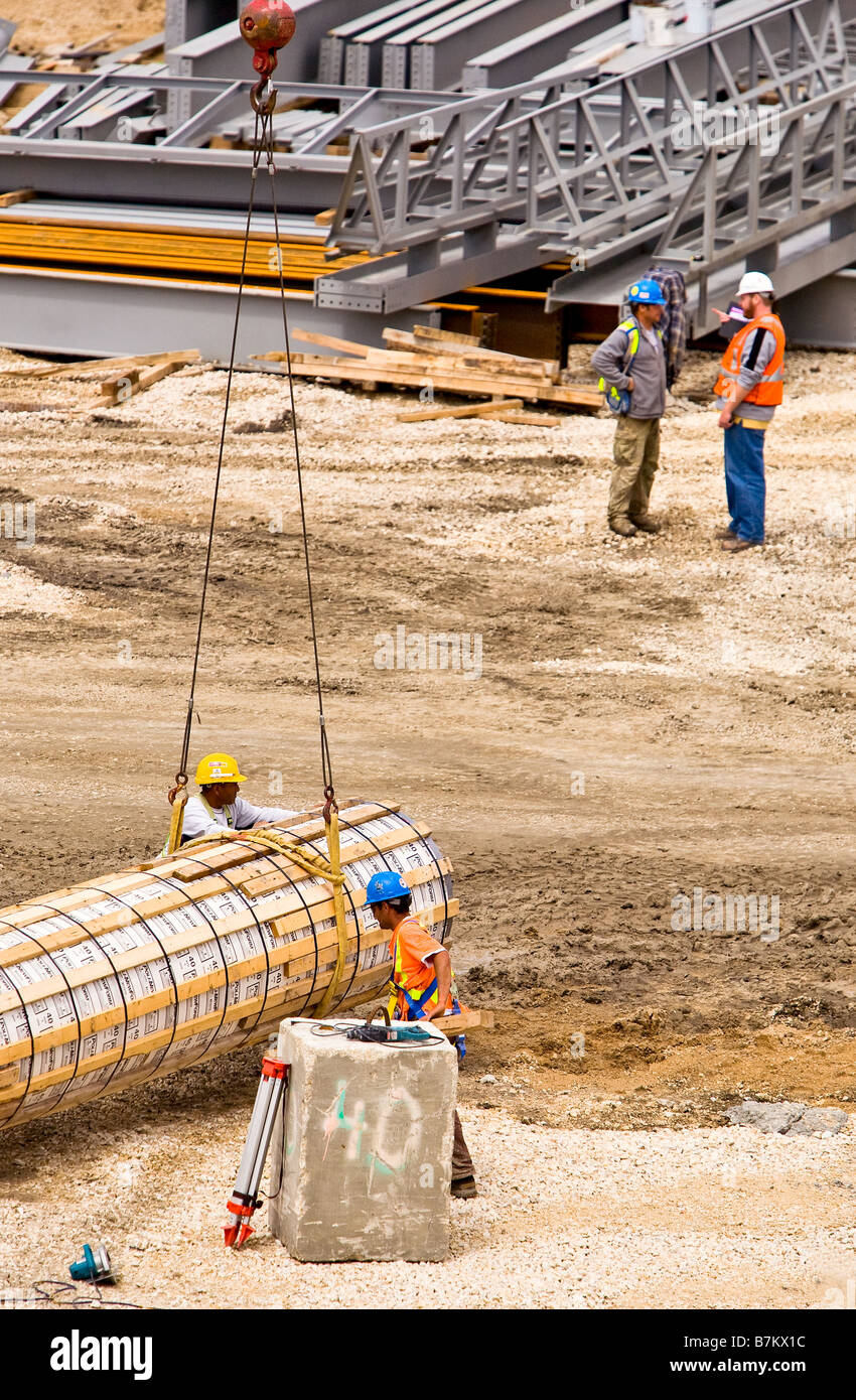 Workers at a construction site Stock Photo