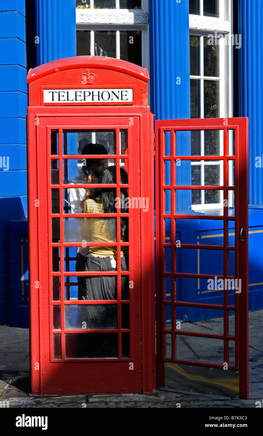 Traditional English Red Phone Box With An Open Door