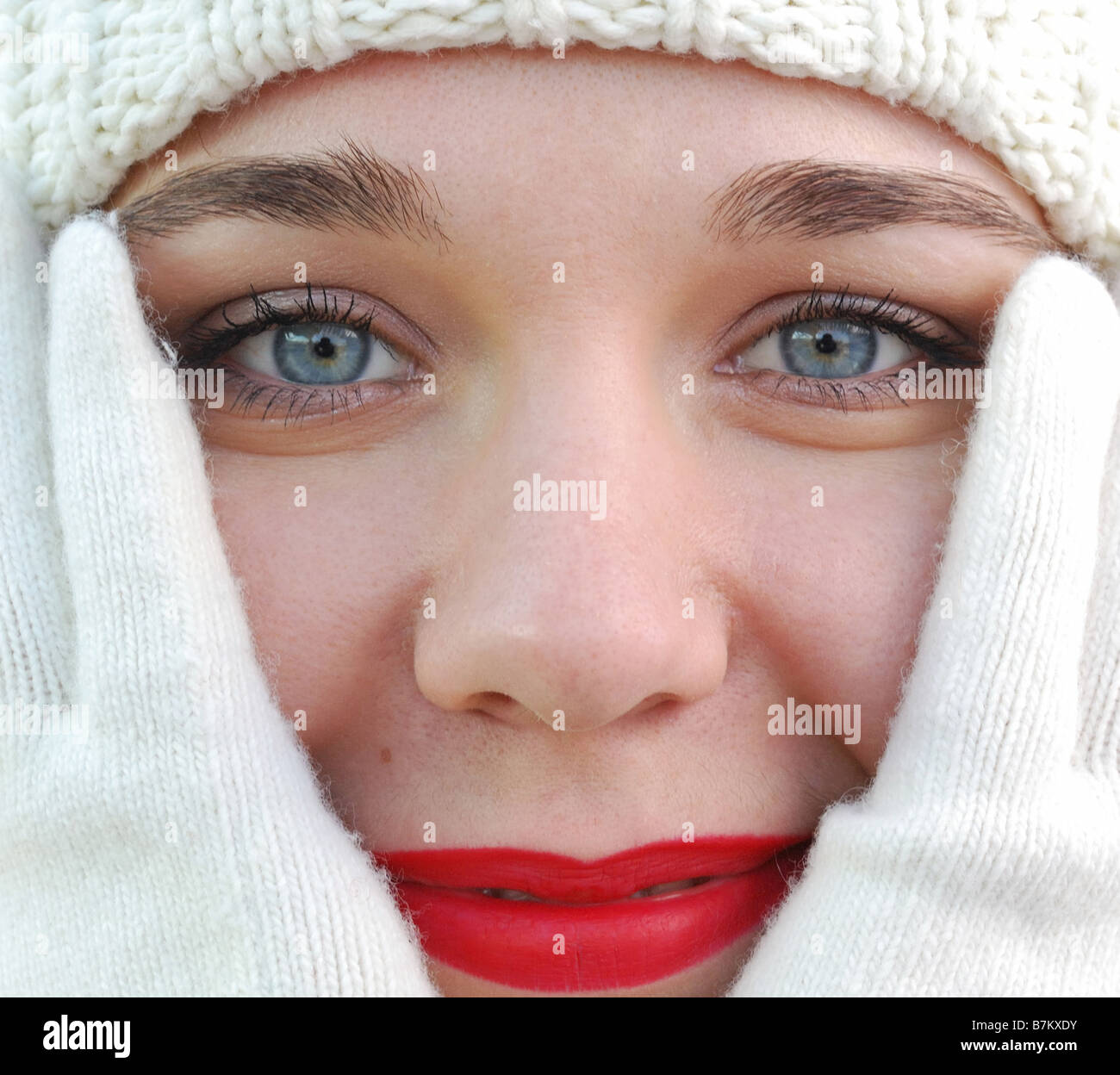 The girl in winter gloves Winter clothes of white color Stock Photo Alamy