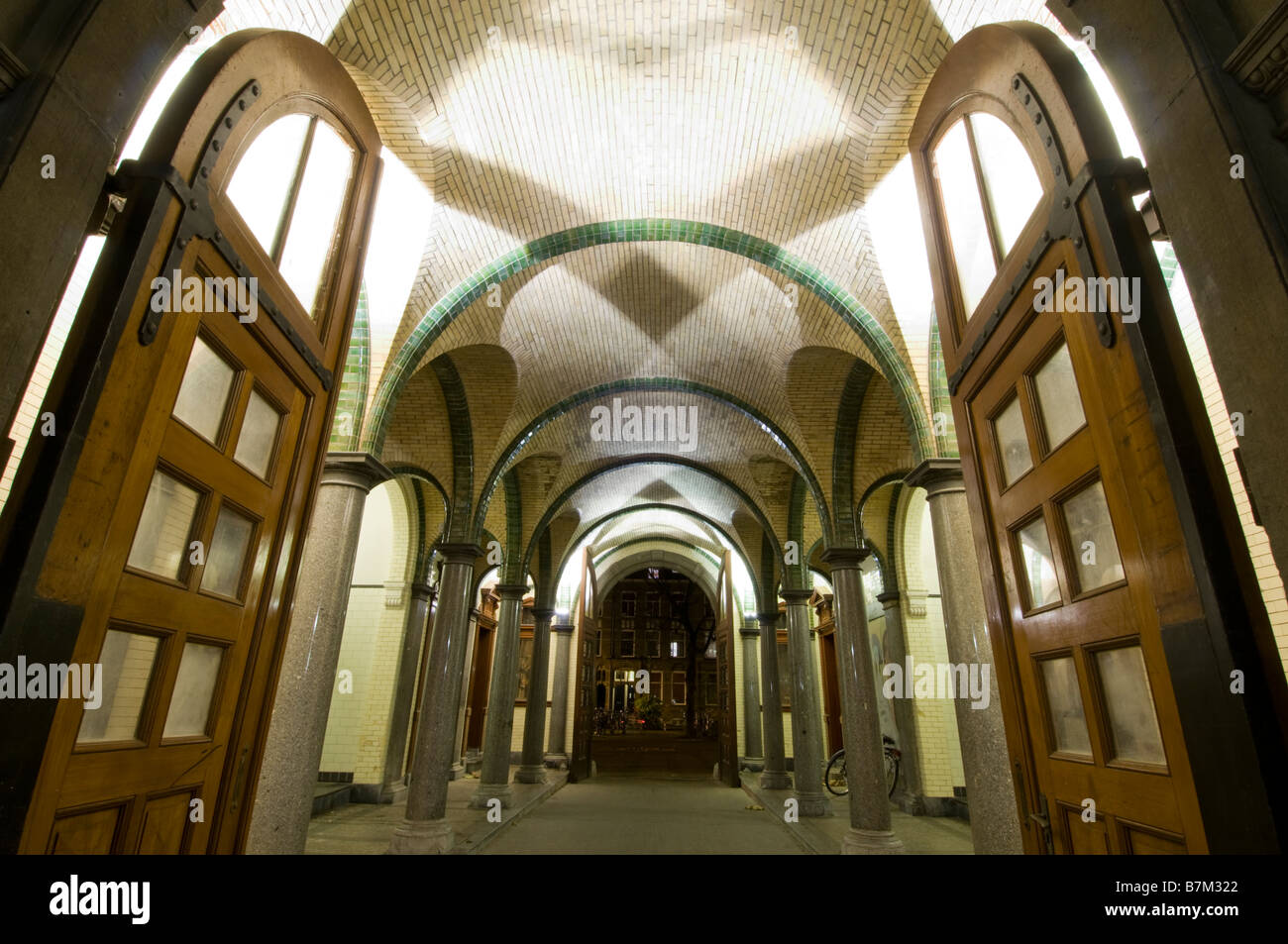Night wide shot of the passthrough entry into former hospital Wilhelmina Gasthuis in Amsterdam Stock Photo