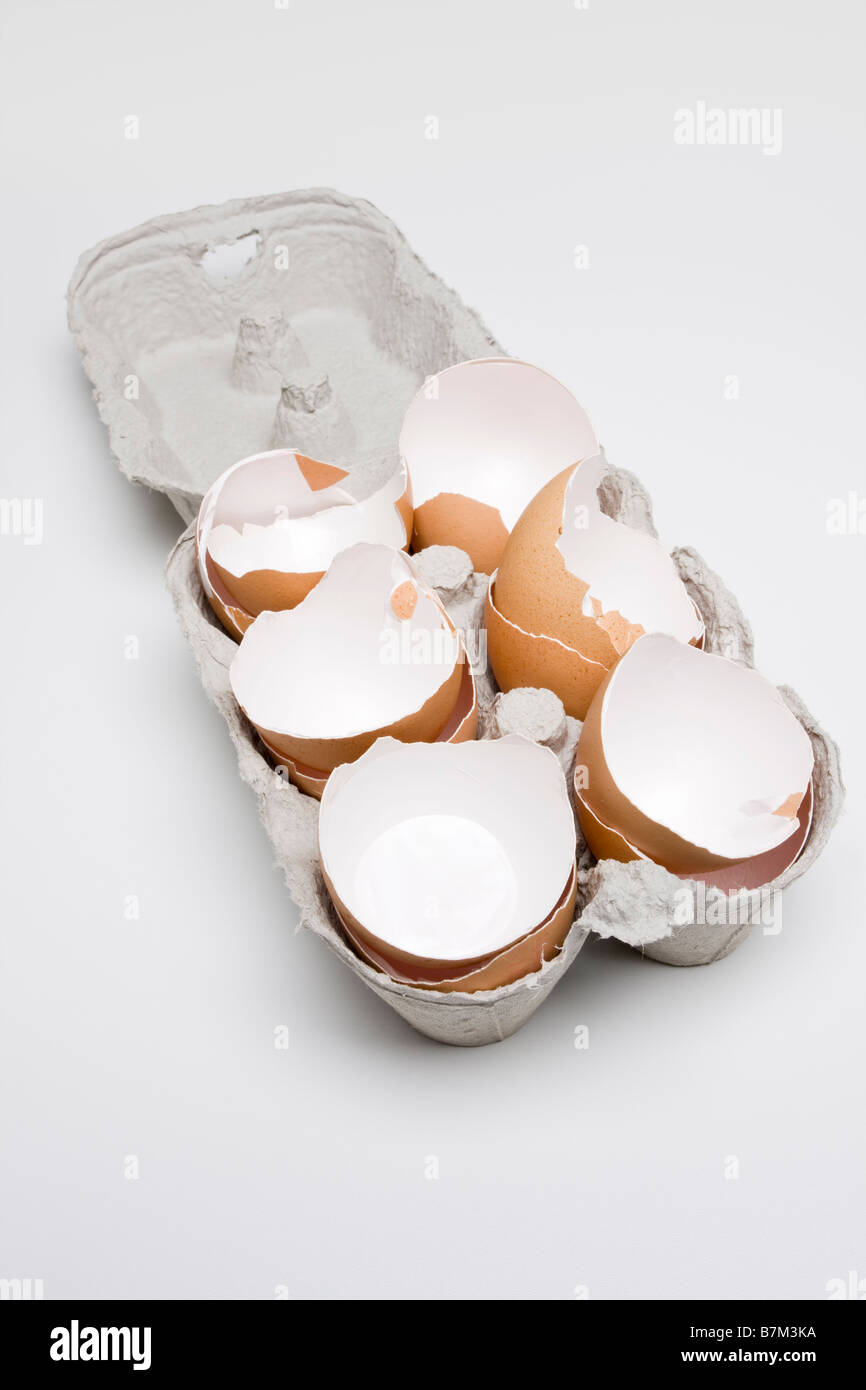 Broken eggshells in an eggbox Stock Photo