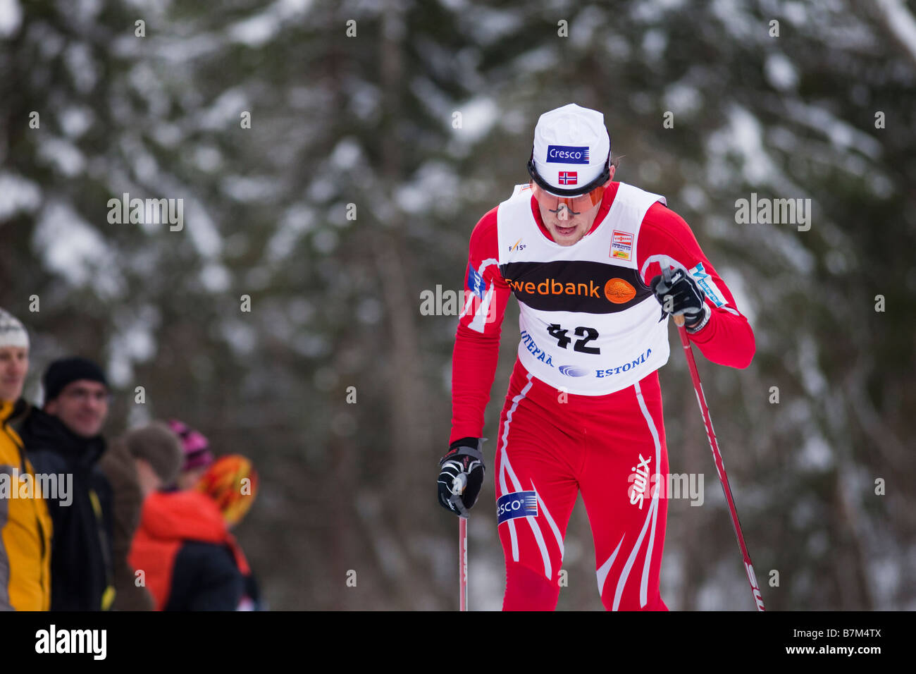 cross country ski racer John Kristian Dahl in a classic race, crowd