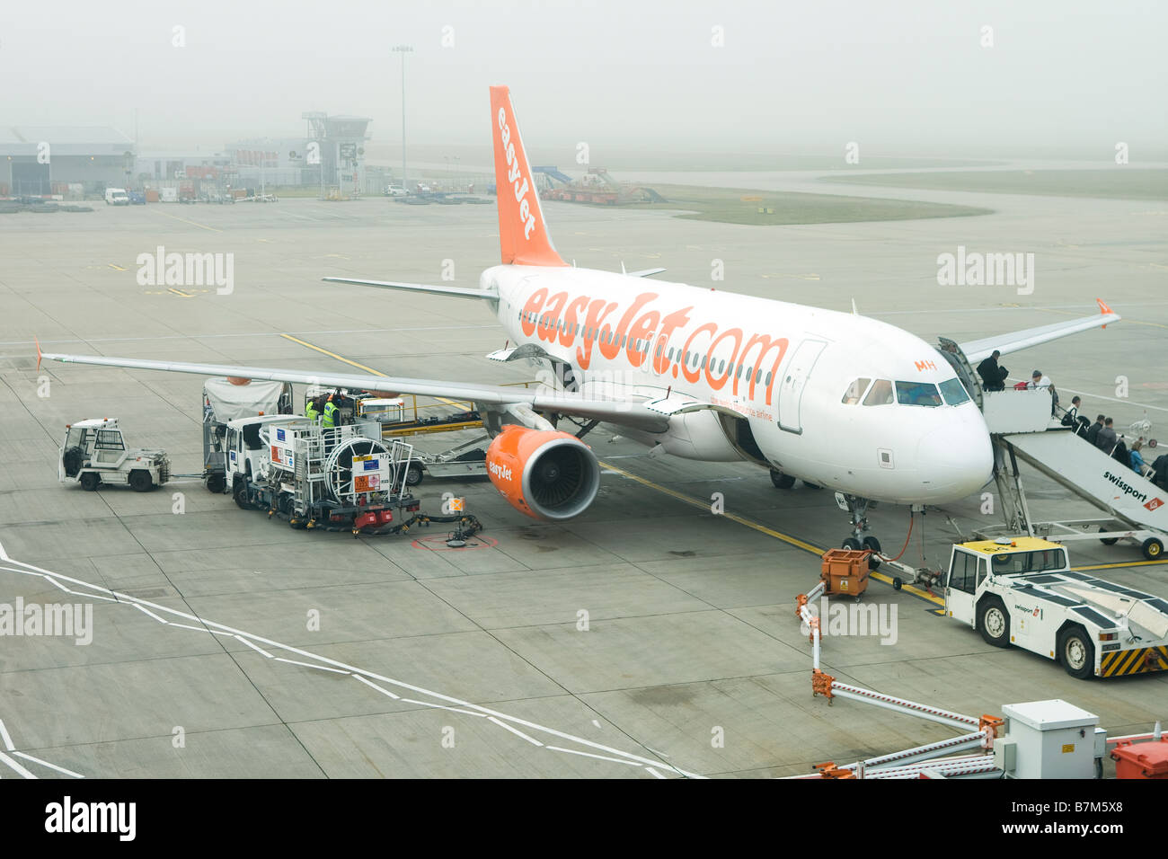 Easy Jet plane on stand Stansted Airport Essex England Stock Photo