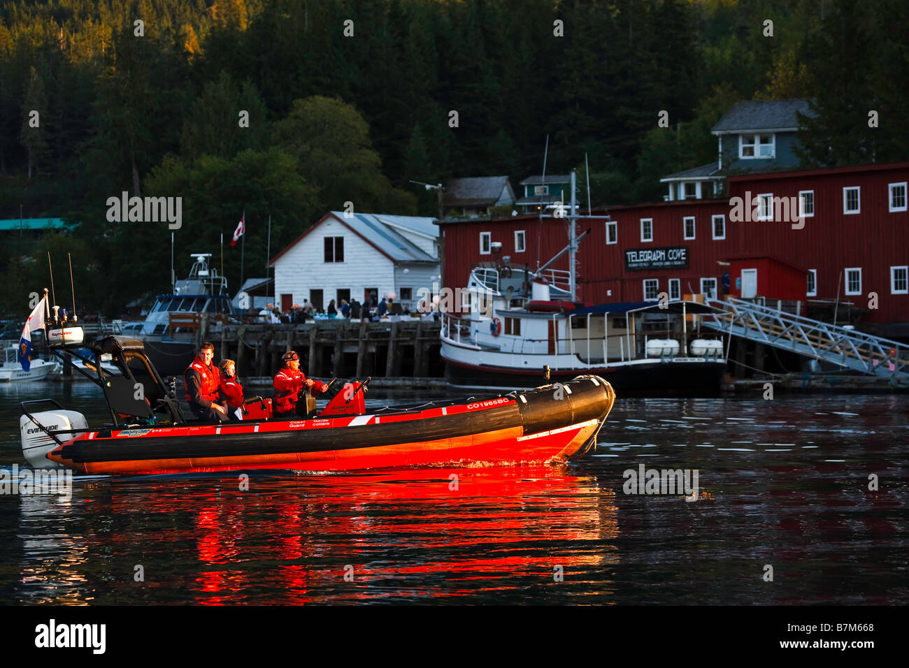 Coast guard 508 zodiac boat in front of historic Telegraph Cove in