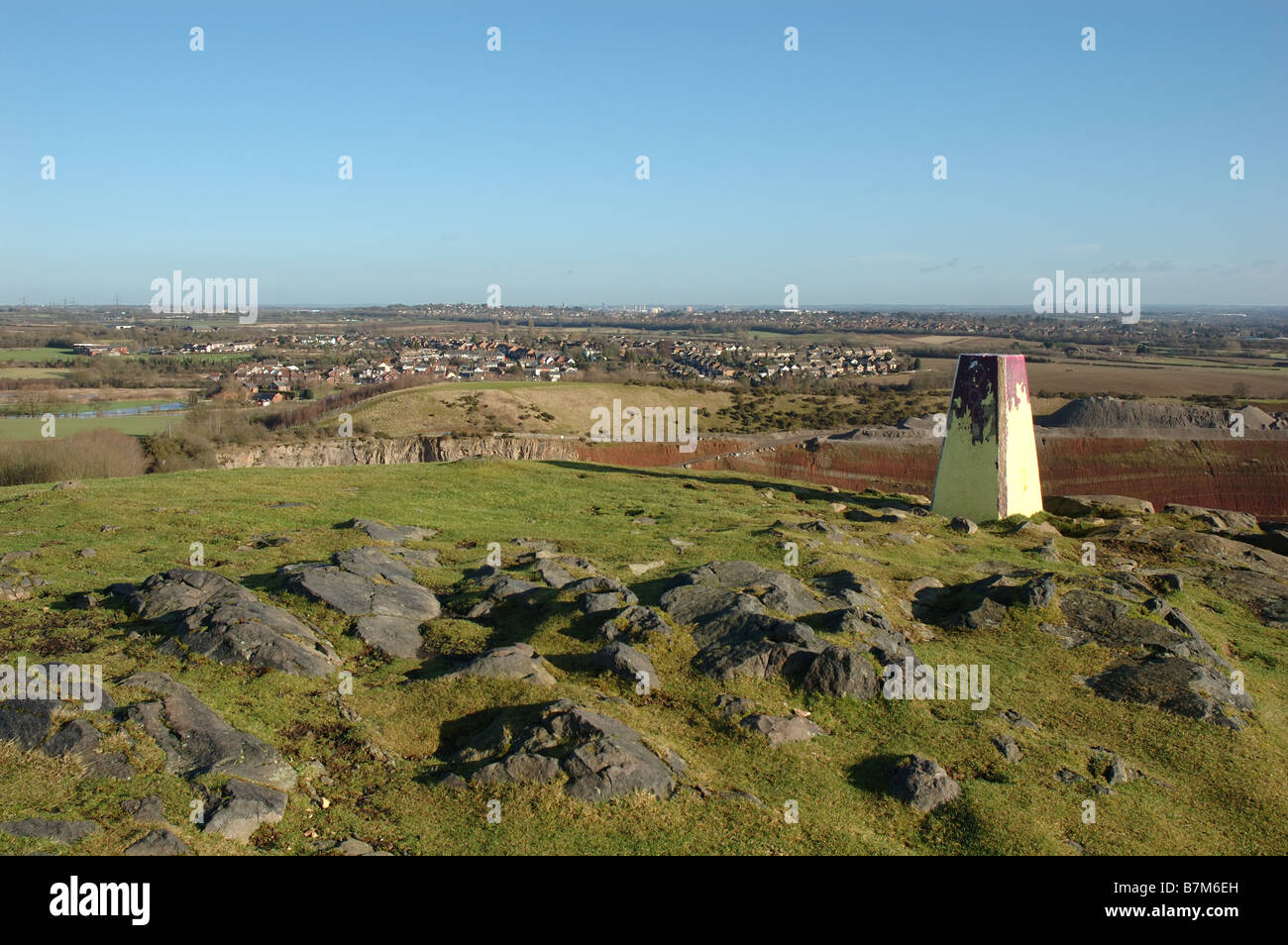 the summit of Croft Hill with the village of Huncote in the distance