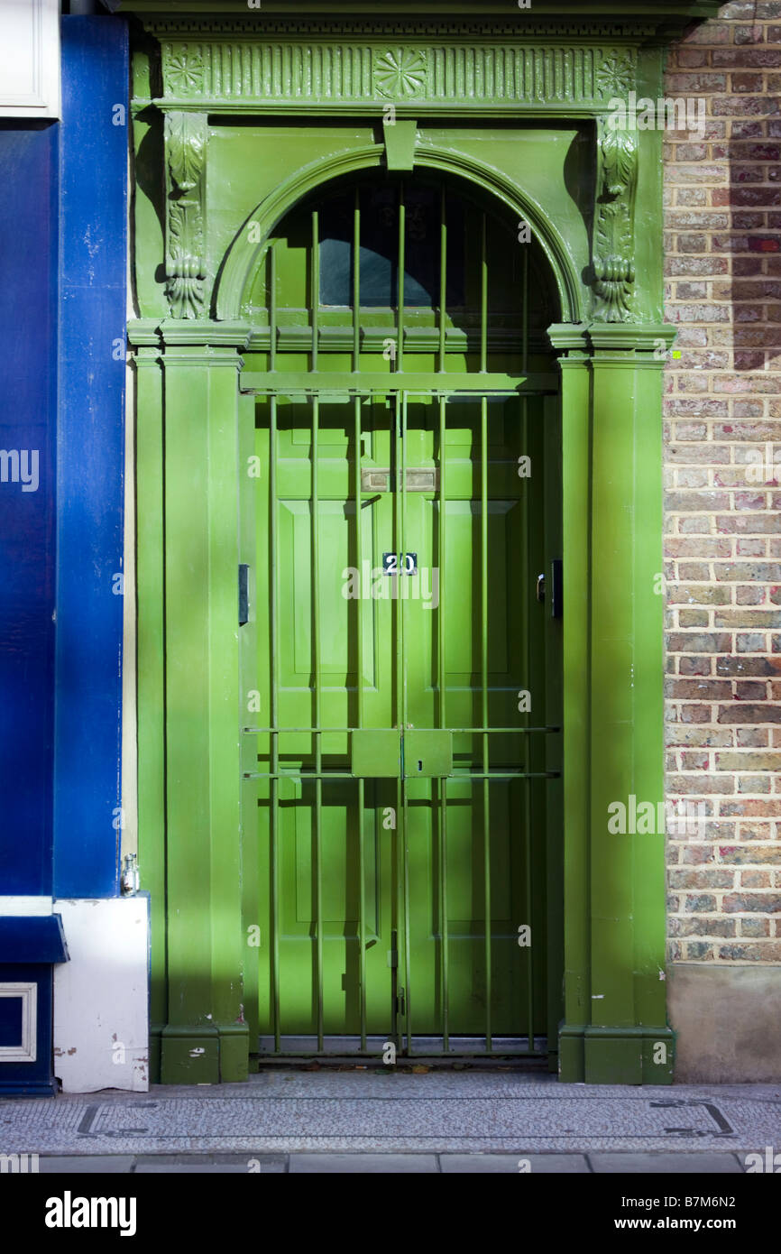 House Door With Iron Security Gate London Stock Photo