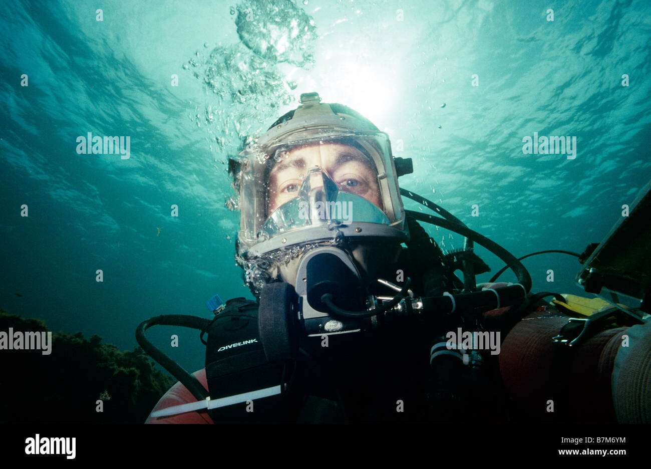 Diver in full face mask. Stock Photo