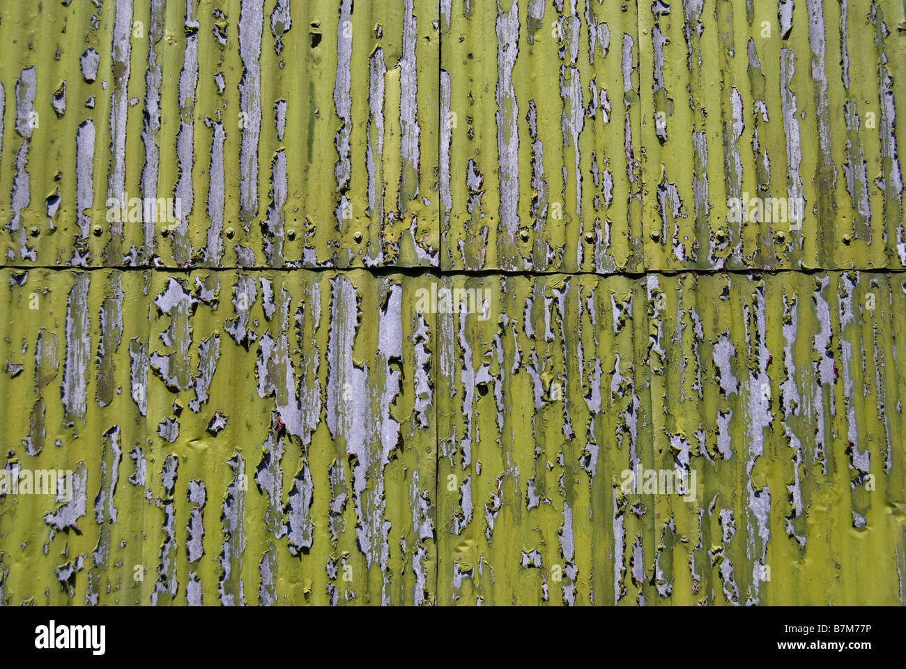 Corrugated iron shed with peeling paint, Little River, Banks Peninsula, Canterbury, New Zealand Stock Photo