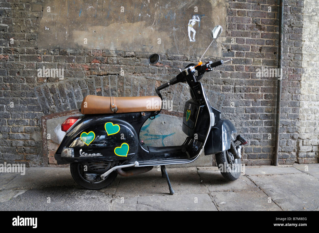 Vespa scooter with heart decals, London Stock Photo
