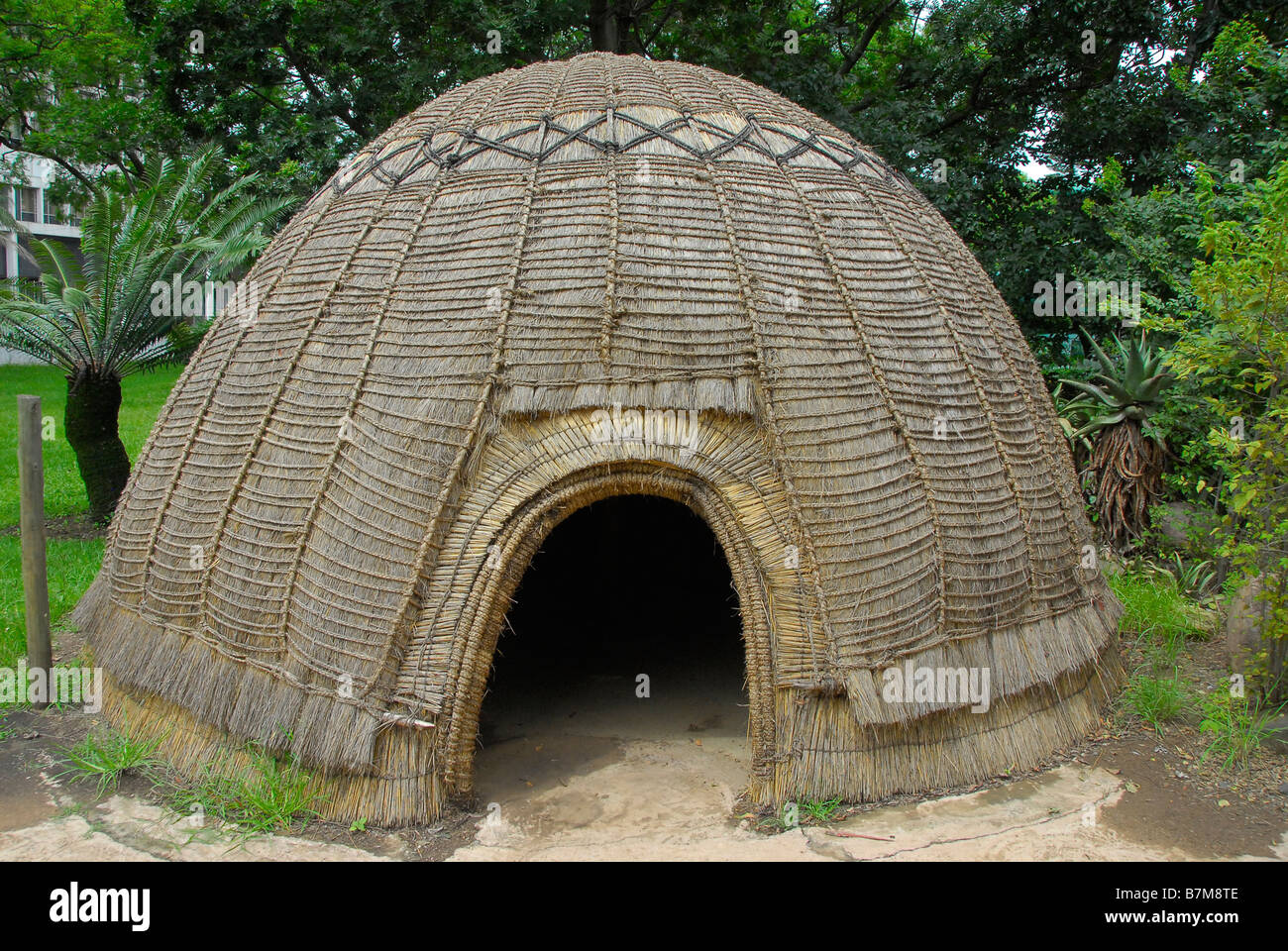 Traditional Zulu hut, called an umuzi. Not used very often anymore today. Pietermaritzburg, South Africa Stock Photo