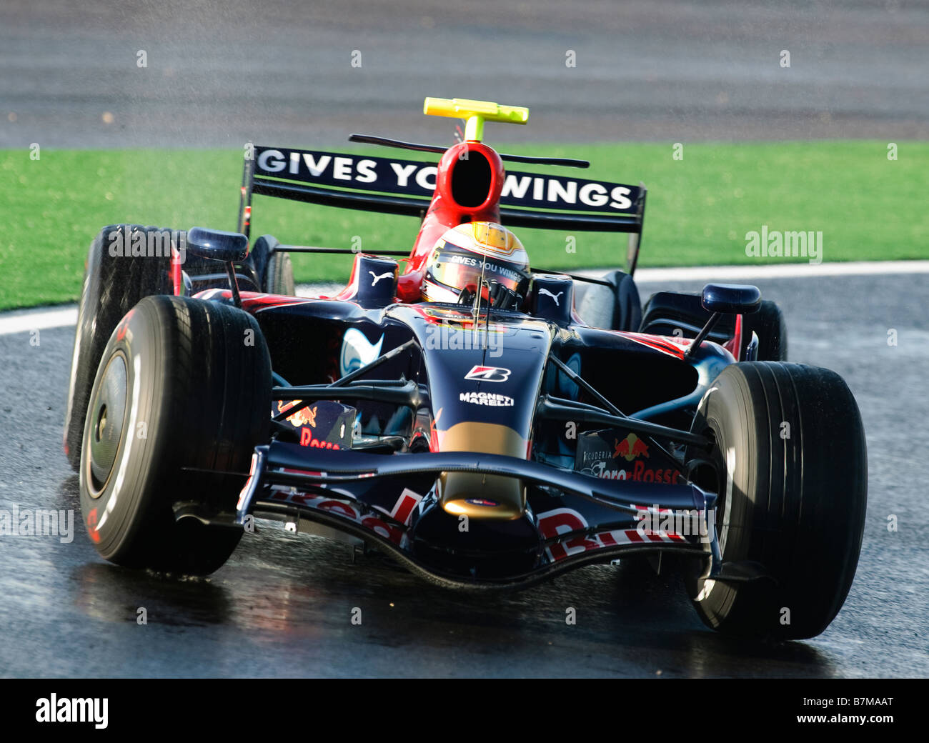 Sebastien Buemi testdrives the Toro Rosso STR3 Formula One racecar in January 2009 Stock Photo