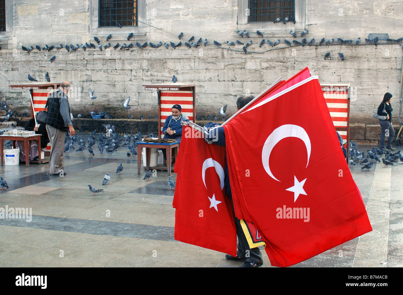 Man selling Turkish flags near New Mosque Istanbul Turkey Stock Photo Alamy